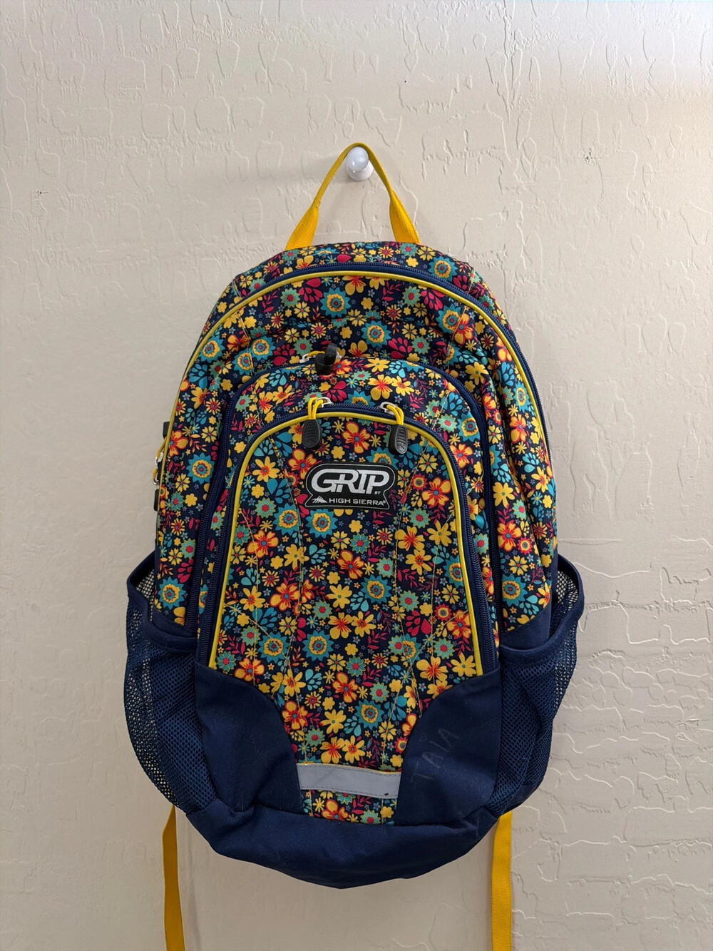 High Sierra Grip floral yellow blue backpack